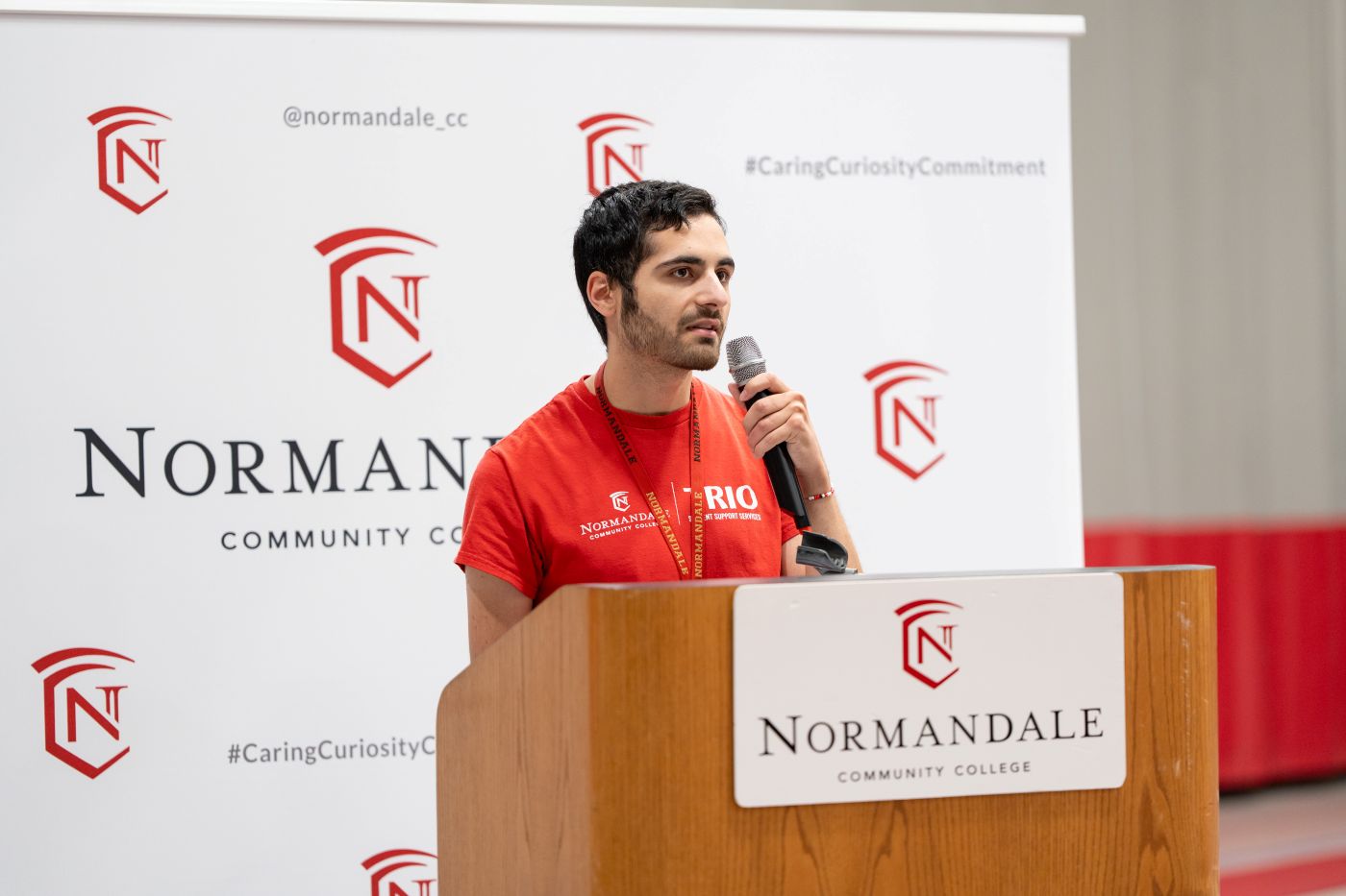 Alex Elbaz speaking at TRIO Anniversary event